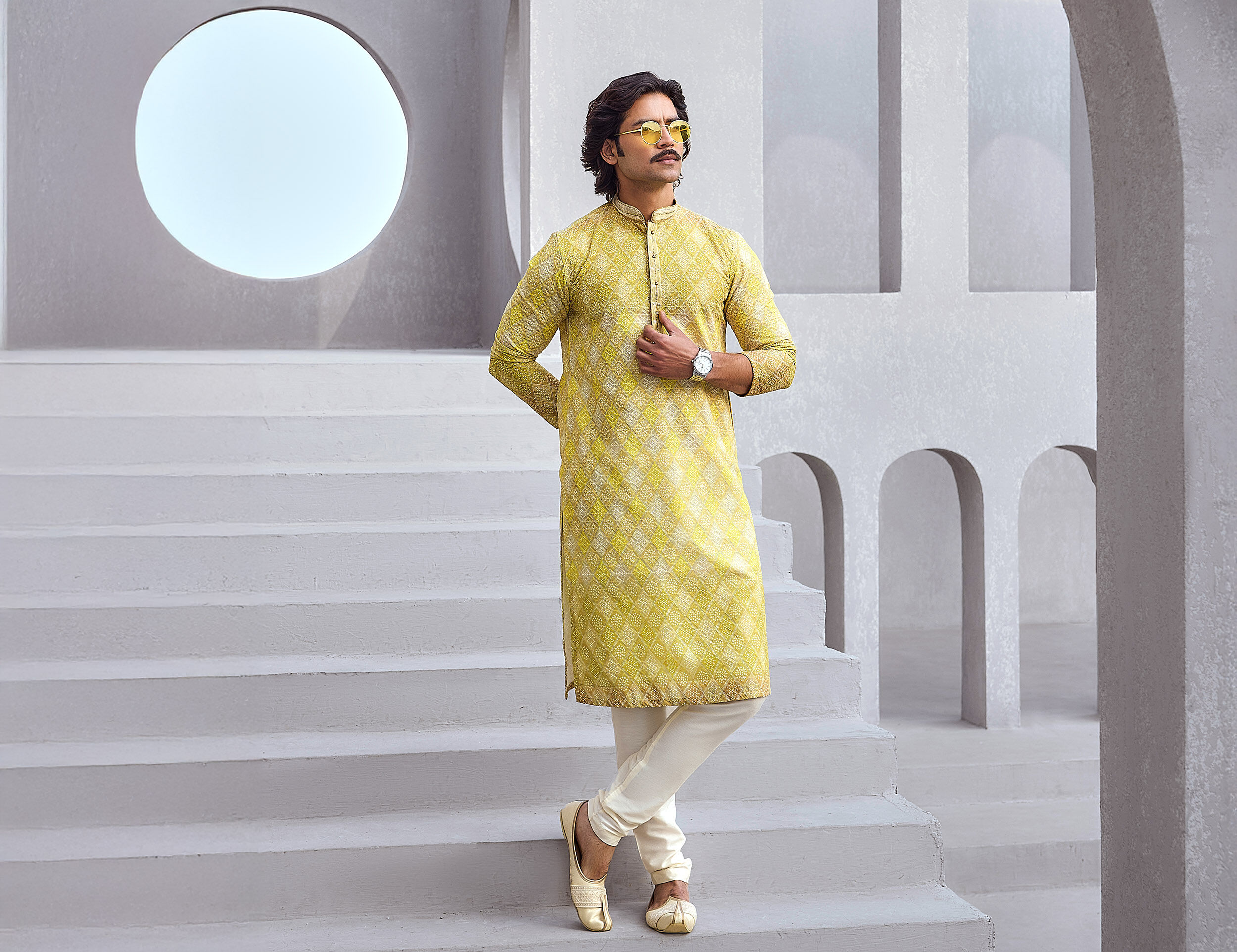 Men in beautifull yellow kurta pajama for haldi ceremony.